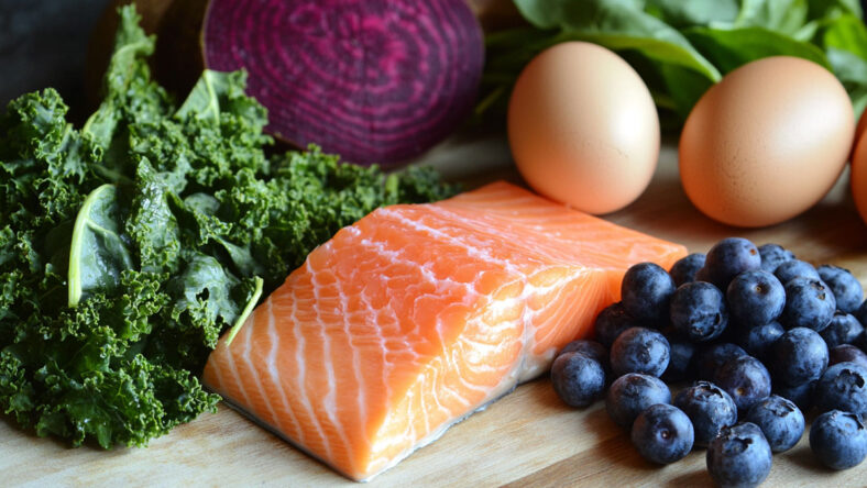 The best foods for aging bodies, including wild salmon, blueberries, eggs, and kale.