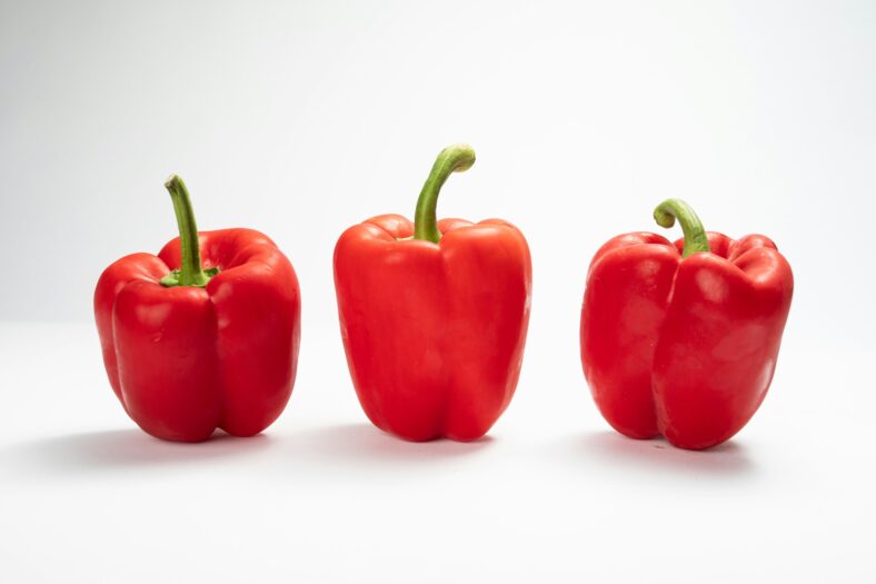 three red bell peppers
