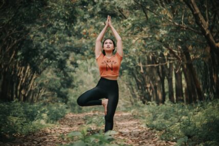 woman doing tree pose / balance exercises