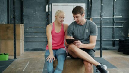 two people in a gym / partner workouts