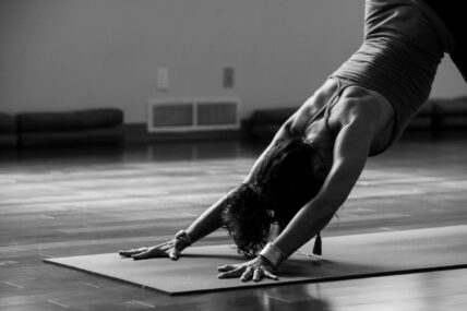 woman doing yoga black and white