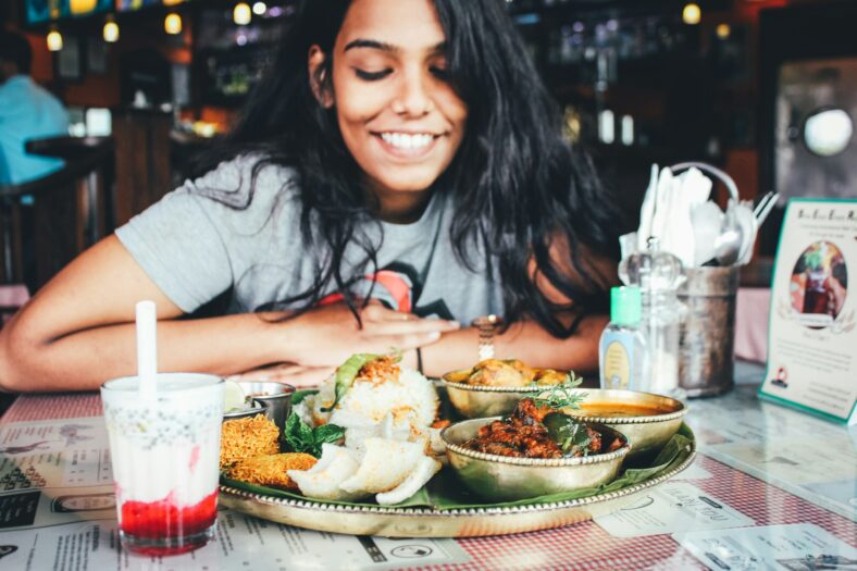 woman with a full plate of food