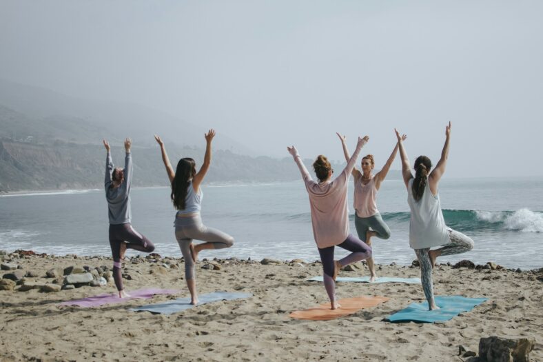 yoga class on sand