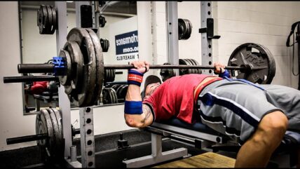 man doing a bench press / bench press workout