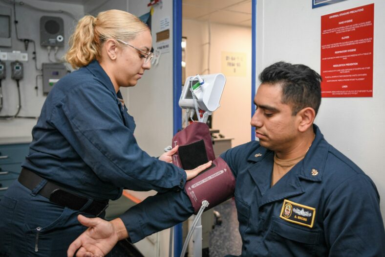 taking someone's blood pressure