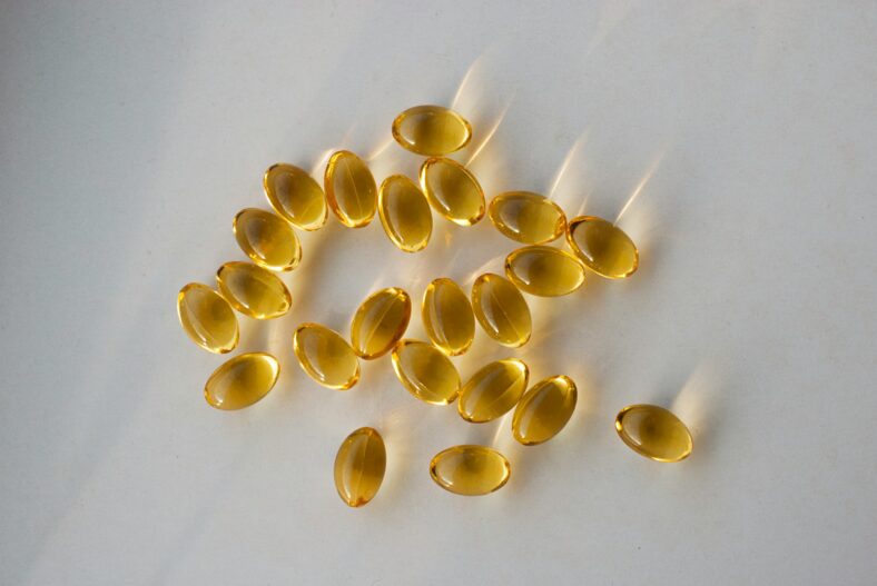 liquid capsules on table
