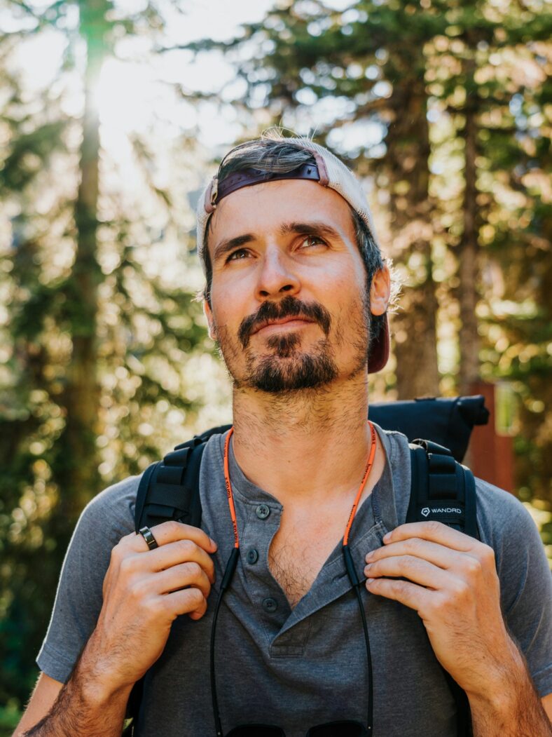 man wearing oura ring