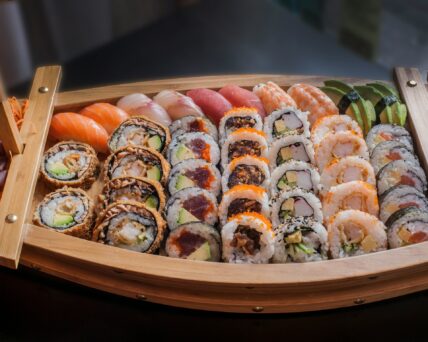 sushi in wooden boat