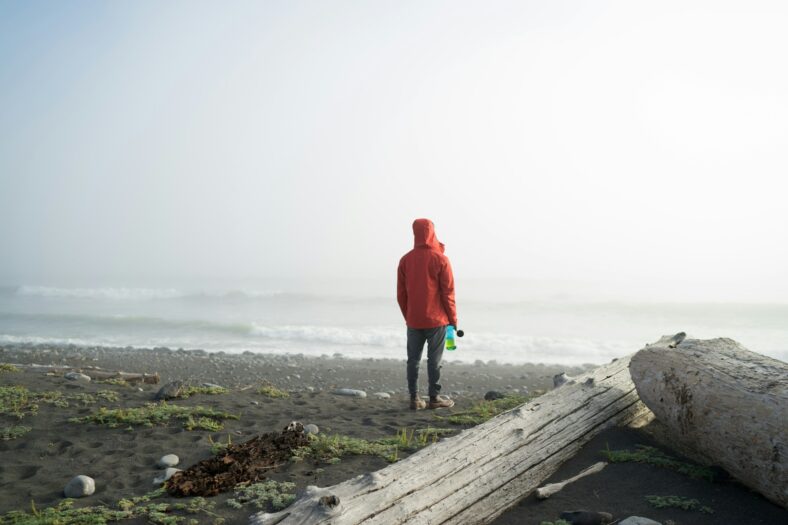 man standing on beach