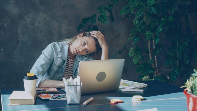 woman stressed at laptop